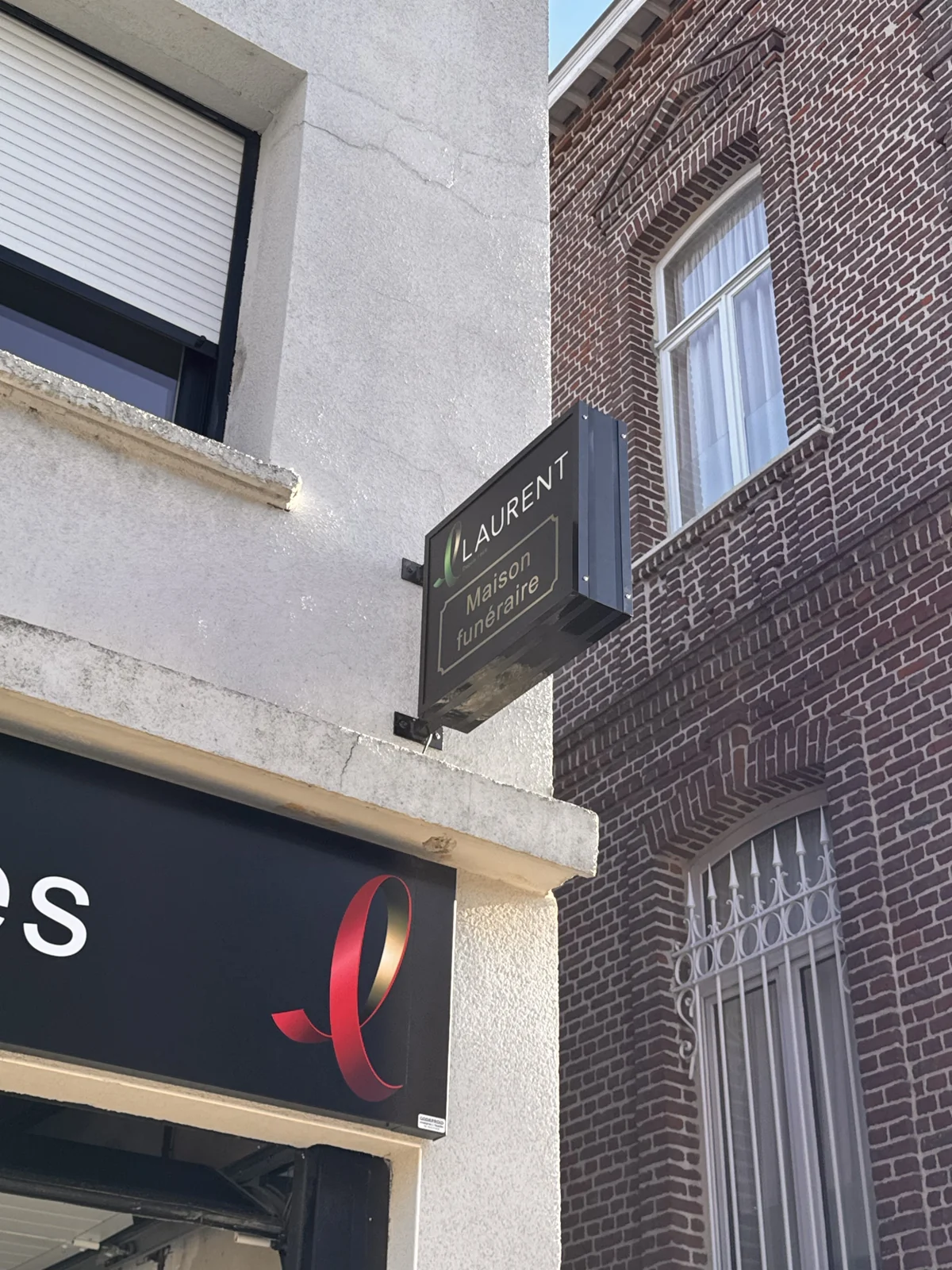 L’enseigne de la maison de Carnières